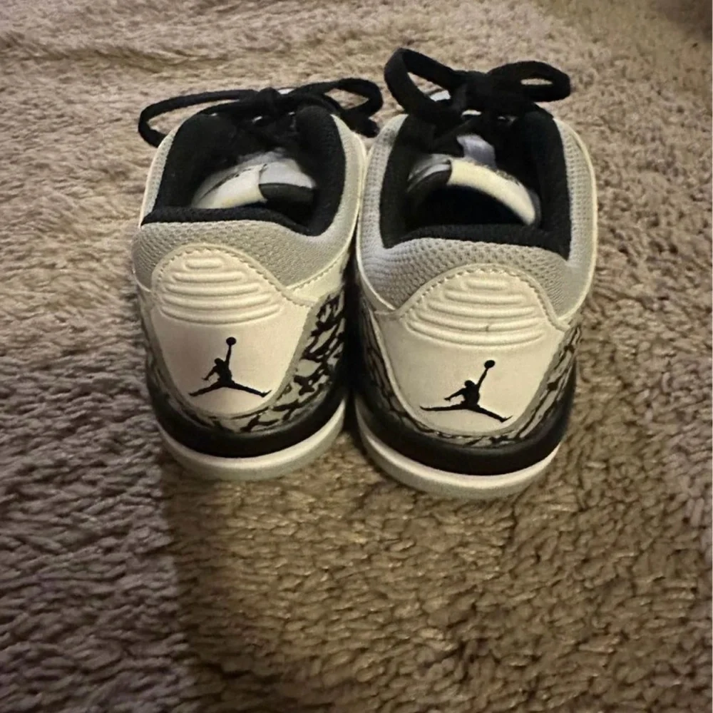 Jordan Kids Black and White Nike Strap Sneakers